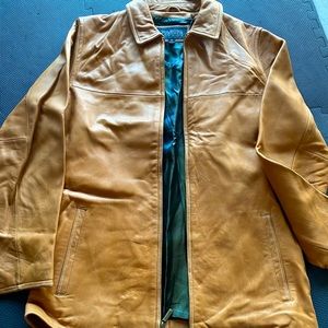 Wilson’s cognac leather jacket size medium like new.